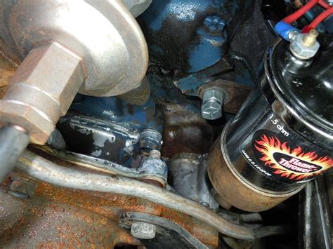 I had the <b>timing</b> <b>cover</b> w/water pump still attached in the palm of my hand. . Ford 302 timing cover coolant leak